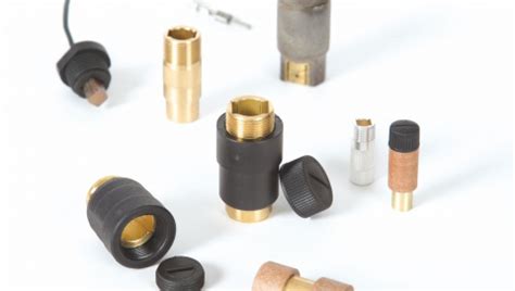 Tubular brush holders and threaded caps .